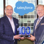 Executive Mosaic’s Jim Garrettson Delivers Booz Allen Hamilton’s Judi Dotson 2023 Wash100 Award