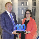 Executive Mosaic’s Jim Garrettson Delivers Booz Allen Hamilton’s Judi Dotson 2023 Wash100 Award